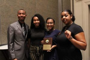 From left to right, Blake Barnes, former president of the Virginia NAACP’s Youth and College Division, poses with UMW student Khaila Nelson, UMW NAACP former president Kelsey Chavers '19 and current president Brianna Reaves at the Virginia State Conference, where the NAACP at UMW chapter won the "On Your Way" award.