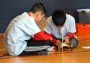 Alexander Fang, 11, (left) and Sidh Jaddu, 11, (right), fifth-graders at Forestville Elementary School in Great Falls, comptete in the Mousetrap Vehicle competition. Science-related contests were held in UMW's recently renovated Jepson Science Center and in other areas on campus. Photos by Suzanne Carr Rossi.