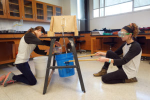 Ashleigh Yaghmour (left) and Heidi Burke (right) of Oakcreat School in Vienna compete in the Boomilever competition. The Virginia Science Olympiad supports STEM education. Photos by Suzanne Carr Rossi.