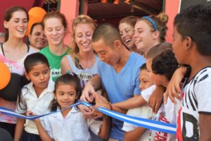 Shin Fujiyama '07 inaugurates a school built by SHH in December 2018. The nonprofit has built 55 schools across Honduras, which are currently closed due to COVID-19. Construction on four other schools has come to a halt and over 200 grassroots fundraising events have been canceled. Photo courtesy of SHH.