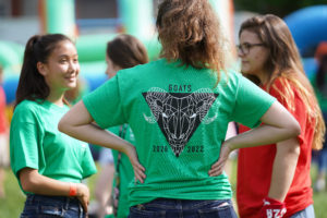 A "Goat," which includes students who graduate in even-numbered years shows off her T-shirt during the 2019 Devil Goat Day event. Goats compete against devils, who graduate in odd-numbered years during the longtime UMW tradition. Photo by Suzanne Carr Rossi.
