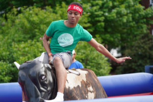 A mechanical bull-riding competition has become part of traditional Devil Goat Day events. This year, the uniquely UMW tradition is taking place virtually. Photo by Suzanne Carr Rossi.