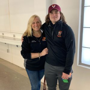 Shepherd with her son, Carter, who will attend college in Pennsylvania this fall. A recent James Monroe High School graduate, Carter swam for the high school's swim team under Konrad Heller, Shepherd's former teammate.