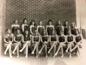 Shepherd (front row, fourth from right) with the Mary Washington 1990-91 women's swim team. A competitive distance swimmer, Shepherd set the CAC record for the 500 freestyle during her freshman and sophomore years.