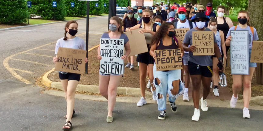 University of Mary Washington students, faculty and staff took part in a march from Campus Walk to