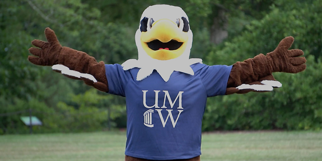 UMW mascot Sammy D. Eagle uses his 6-foot wingspan to illustrate one of the most important social distancing guidelines that will be in effect when the campus community returns in August.