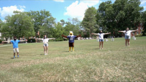 Students stand with Sammy on Ball Circle, where UMW’s iconic Adirondack chairs are now situated farther apart, due to the threat of COVID-19. Schedules, relationships and behaviors will all take on a different feel when classes resume next month.