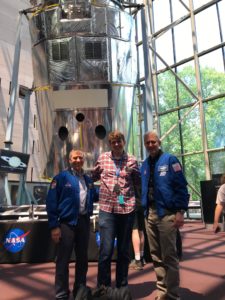 Morris poses between Hubble astronauts John Grunsfeld (left) and Michael Good (right) at NASA's 10th anniversary celebration of servicing mission 4. Photo courtesy of Paul Morris.