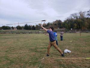 Bova demonstrates an atlatl - an ancient spear thrower - at a conference hosted by the historic preservation department. “He was great with the public as he explained experimental archaeology, a field in which we learn how to make and use the objects we excavate and research," said Assistant Professor of Historic Preservation Lauren McMillan. Photo courtesy of Lauren McMillan.