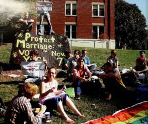 PRISM leads a group of student protestors of the marriage amendment at Spirit Rock in 2007. Photo courtesy of UMW Libraries' Special Collections and University Archives/Battlefield Yearbook.