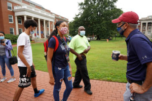 President Paino was on hand to speak with students - and remind them of COVID-19 guidelines - as they moved into residence halls. Photo by Suzanne Rossi.