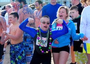 Special Olympian Matthew Doyle prepares for a Polar Plunge fundraiser at Virginia Beach. As a Special Olympics global messenger, Doyle often delivers public presentations based on his motto, “Opening hearts, changing minds.”