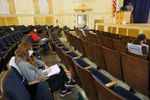 Dodd Auditorium in George Washington Hall is typically reserved for presentations and performances. The 1,200-seat venue is being used as a socially distanced classroom space during the pandemic. Photo by Suzanne Carr Rossi.