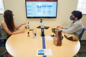 Juniors Kayla Villareal and Liam Kelly study Japanese verbs in the Hurley Convergence Center. Photo by Suzanne Carr Rossi.