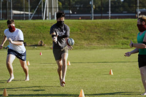 The UMW Men's Rugby team practices on the athletic fields. Photo by Suzanne Carr Rossi.