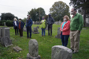 Small groups spread out on this socially distanced tour, which replaced the Historic Preservation Club's popular Ghostwalk this year. Photo by Suzanne Carr Rossi.