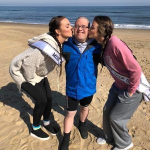 Matthew Doyle goofs of on the beach with his Polar Plunge partners, 2018 Miss Virginia USA Courtney Smits and 2018 Miss Virginia Teen USA Morgan Duty.
