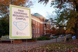 Signs around the Mary Washington campus remind the UMW community to wear masks in public places.