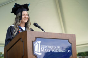 Lillian Lester '20, who served as treasurer of her senior class, spoke to her classmates during the first of nine Commencement ceremonies for the Classes of 2020 and 2021. Photo by Suzanne Carr Rossi.