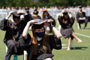 After COVID-19 delayed their Commencement for a year, members of the Class of 2020 finally got to turn their tassels during three socially distanced ceremonies held Thursday and Friday, May 6 and 7. Photo by Suzanne Carr Rossi.