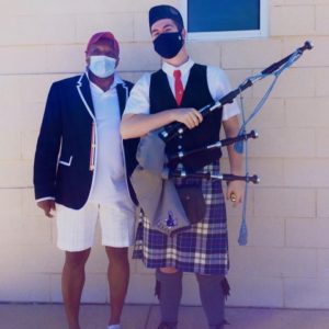 Associate Vice President and Dean of Student Life Cedric Rucker and AJ Gluchowski, with his bagpipes in tow, at one of the Class of 2020 Commencement ceremonies on May 6.