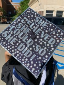 Jasmina Williams '20 models her decorated mortarboard. Members of the Class of 2020 waited a year for their Commencement.