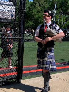 Many traditions - like bagpipes, played here by freshman AJ Gluchowski - remain a part of the UMW Commencement ceremonies.