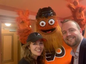 Mike Shane and wife Sarah at the Wells Fargo Center with the Philadelphia Flyers' Gritty, who in just a few years has become one of sports' most recognizable mascots.