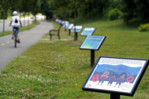 'Alex's Day on the Rappahannock,' which follows a Fredericksburg family as they go tubing and explore the Rappahannock River, will be on display through the end of the summer. Photo by Suzanne Carr Rossi.