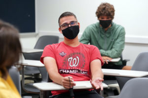 Freshman Edward Haggerty participates in a Common Experience discussion group. This shared academic milestone gives incoming UMW first-year students the opportunity to engage in critical thinking and college-level discussions with faculty, staff and fellow students. Photo by Suzanne Carter Rossi.