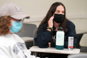 "We don't need most of the fast-thinking system processes that were used thousands of years ago to survive," said first-year Bridget Zagrobelny (right), who learned from the PBS episode that autopilot thinking in modern life often results in mistakes and poor decisions. Photo by Suzanne Carr Rossi.