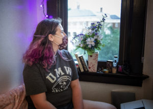 UMW senior Kyra Breslow, a resident assistant in Virginia Hall, specifically chose this room in the newly renovated building. The project salvaged more than 50 percent of the hall's structures and finishes. Photo by Tom Rothenberg.