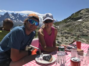 Ambrose and wife Stephanie Lefferts '11 take a break mid-run in Europe. Photo by Giles Ruck.