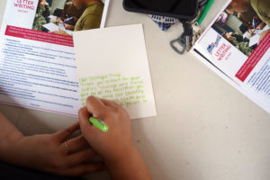 UMW students wrote cards to servicemembers through Operation Gratitude, as well as military families and local veterans. Photo by Suzanne Carr Rossi.