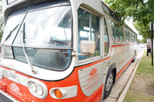 A vintage 1960s bus, on loan from a Roanoke museum, parked at the site of the former Fredericksburg bus station where the Freedom Riders stopped. Photo by Suzanne Carr Rossi.