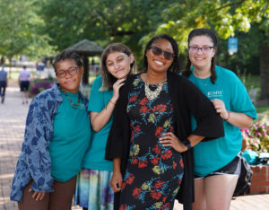 Center for Prevention and Education Director Marissa Miller and TEAL Peer Educators (left to right) Maya Jenkins, Kayla Botto and Grace Bonaccorsy. In her new role, Miller will oversee the continuation of a $300K grant from the Justice Department's Office on Violence Against Women. Photo by Suzanne Carr Rossi.