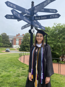 Repko earned a degree in Spanish from UMW in December 2019. She was scheduled to walk in May of 2020, but due to the pandemic, she couldn't participate in an official ceremony until this past spring. Here, she stands by the Center for International Education sign in front of Lee Hall.