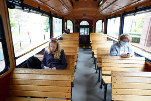 UMW students Ella Krygiel (left) and Meredith Glasco (right) ride the Fredericksburg Trolley to their polling place in order to vote on Election Day. UMW Votes works to provide free rides to the polls. Photo by Suzanne Carr Rossi.