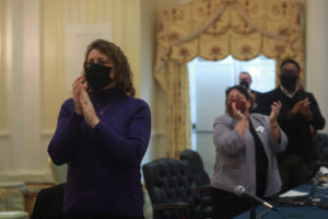 New UMW Board of Visitors member Kerri S. Barile ’94 joins Rucker's standing ovation. Photo by Karen Pearlman.