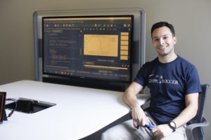 UMW senior Steven DeVerteuil is the first to take advantage of a 4+1 pathway in computer science that allows students to receive early admission to grad school and spend less time earning a master's degree. Photo by Karen Pearlman. 