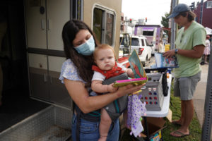 Cobb keeps books stocked for readers of all ages to peruse at local events - and hopefully take home to enjoy. Photo by Suzanne Carr Rossi.