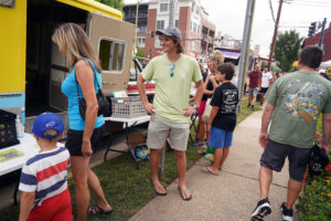 Cobb cleaned, repaired and painted the Bookmobile in time for its launch at the Aug. 21 farmer's market in Fredericksburg's Hurkamp Park. Photo by Suzanne Carr Rossi.