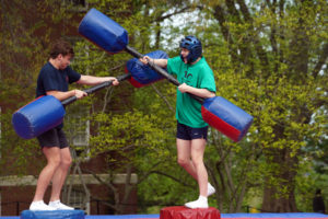 Luke Rosentel and Brent Pham compete in the gladiator joust. Photo by Suzanne Carr Rossi.