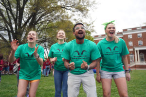 From left to right: Amber Zipfel, Natalie Buchanan, Bennet Varghese and Victoria Percherke cheer on their fellow Goats riding the mechanical bull. Photo by Suzanne Carr Rossi.