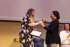 Senior Katie Warlick received the Alex Naden Award, presented by Associate Dean of Student Involvement Melissa Jones. Photo by Kayla Zegada.