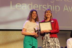 Senior Carleigh Rahn received the Elizabeth M. Baumgarten Service Award, presented by Sarah Dewees, associate director of UMW's Center for Community Engagement. Photo by Kayla Zegada.