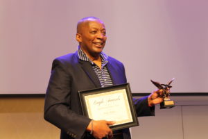 Associate Vice President and Dean of Student Life Cedric Rucker accepted the first-ever Eagle Beyond Compare Award, which appropriately included one of his signature bowties. Photo by Kayla Zegada.