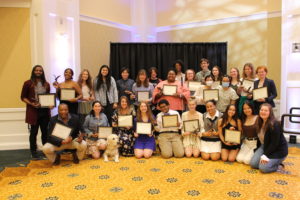 The winners posed for a group photo after the Eagle Awards ceremony. Photo by Kayla Zegada.