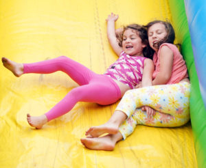 Giant inflatables are always part of the fun at the Multicultural Fair, which brings a taste of the world to campus. Photo by Suzanne Carr Rossi.