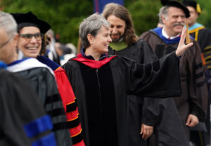 Historic Preservation faculty, including Cristina Turdean (center) greet graduates while processing onto Ball Circle. Photo by Suzanne Carr Rossi.